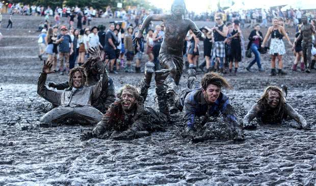 Splendour punters laying in the mud