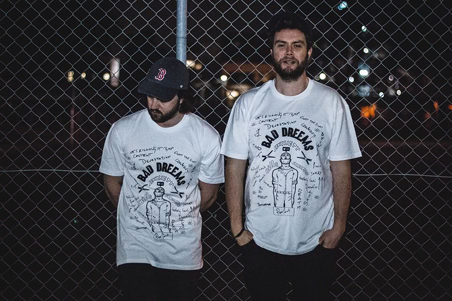 Bad//Dreems’ James Bartold and Miles Wilson wearing the band's Support Act t-shirt