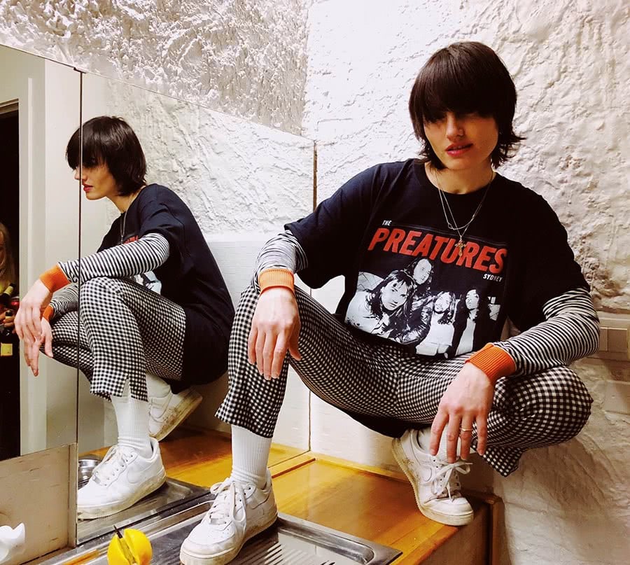 The Preatures' Isabella Manfredi wearing the band's Support Act t-shirt
