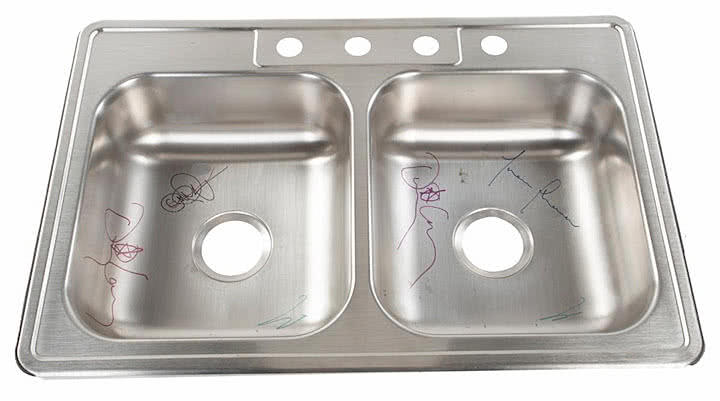 Kitchen sink signed by members of Tool
